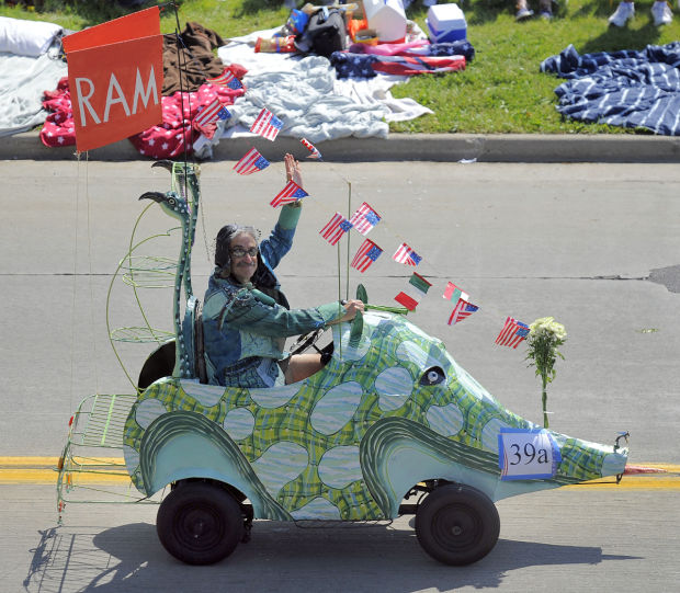 Writer Mark Hertzberg peddles the Reidster in the 2014 parade.